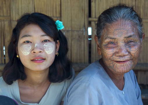 Tribal Chin Woman With Spiderweb Tattoo On Her Face With Her Little Daughter, Mrauk U, Myanmar