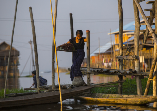 Woman Embarking On A Boat, Inle Lake, Myanmar