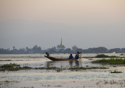 Traditional Fisherman With Fish Trap In Boat, Inle Lake, Myanmar