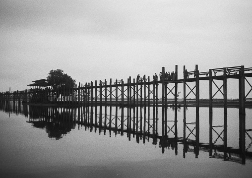 People Crossing U Bein Bridge In Amarapura, Mandalay, Myanmar