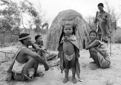 Bushman People Around A Fire In A Traditional Village, Tsumkwe, Namibia