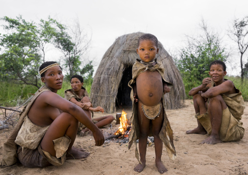 Bushman People Around A Fire In A Traditional Village, Tsumkwe, Namibia