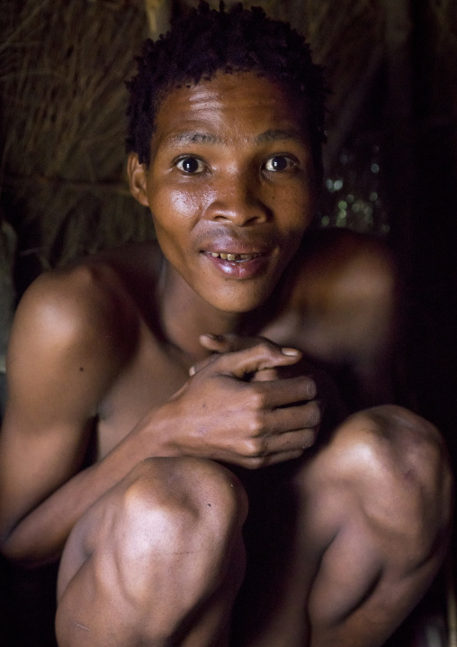 Bushman Inside His Hut, Tsumkwe, Namibia