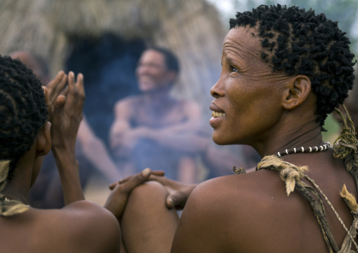 Bushman People Around A Fire In A Traditional Village, Tsumkwe, Namibia