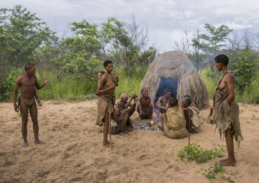 Bushman People Around A Fire In A Traditional Village, Tsumkwe, Namibia