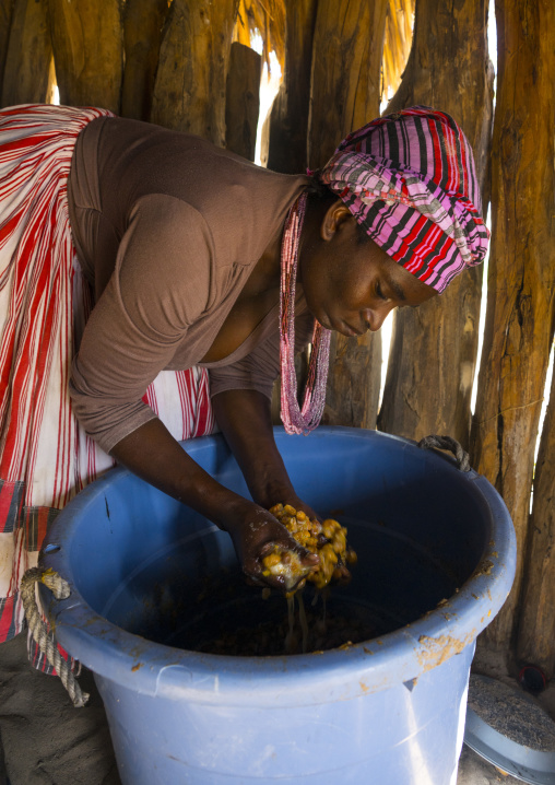 Ovambo Girl Making Ombike Alcohol, Ondangwa, Namibia