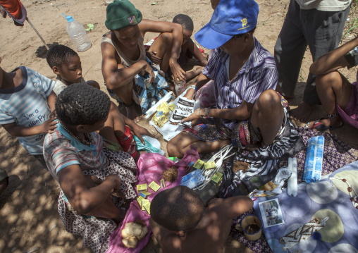 Group Of Bushman Woman Sharing Tobacco, Tsumkwe, Namibia