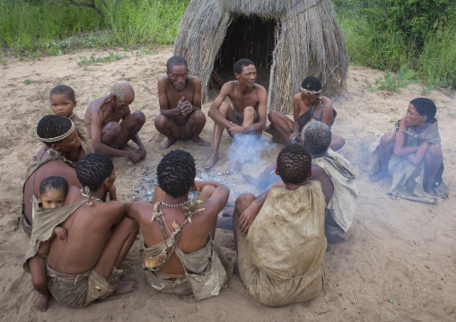 Bushman People Around A Fire In A Traditional Village, Tsumkwe, Namibia