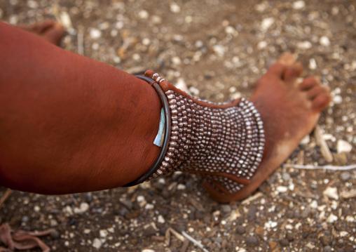 Himba Woman With Beaded Anklets To Protect Their Legs From Venomous Animal Bites, Epupa, Namibia