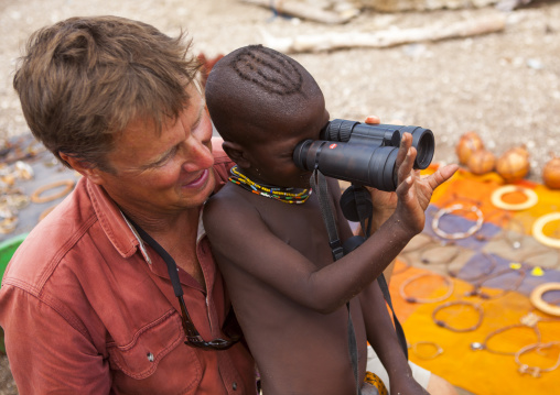 Himba Child Looking Thru Binoculars, Epupa, Namibia