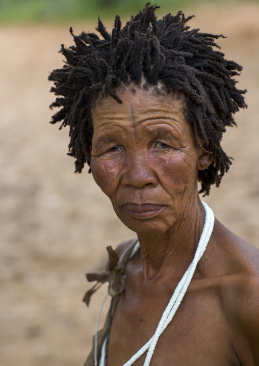 Bushman Woman With Traditional Hairstyle, Tsumkwe, Namibia