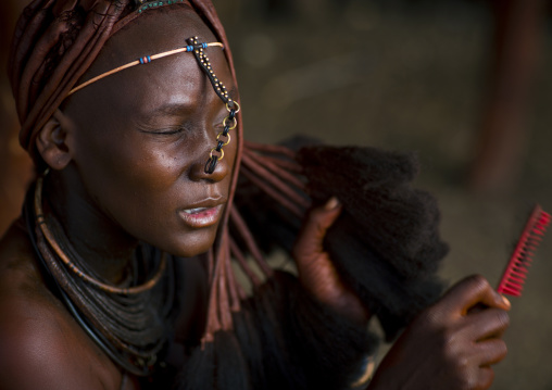 Himba Woman Taking Care Of Her Hair, Epupa, Namibia