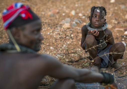 Himba Family In Front Of The Sacred Fire, Epupa, Namibia