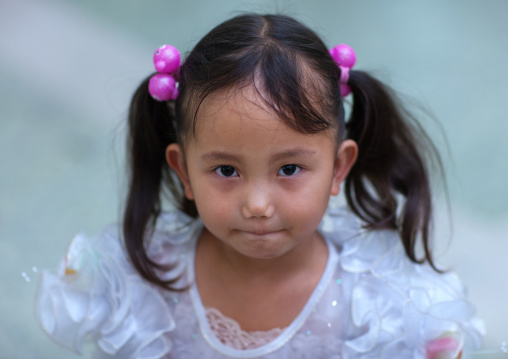 Portrait of a North Korean girl with plaits, Pyongan Province, Pyongyang, North Korea