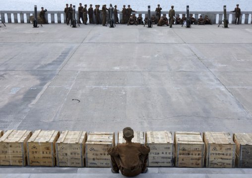 North Korean soldiers during a fireworks preparation on Taedong river, Pyongan Province, Pyongyang, North Korea