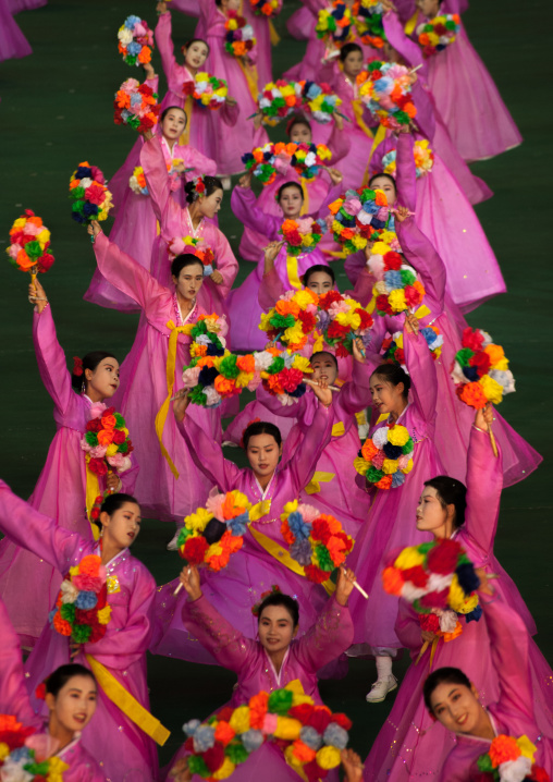 North Korean women dancing in choson-ot during the Arirang mass games in may day stadium, Pyongan Province, Pyongyang, North Korea