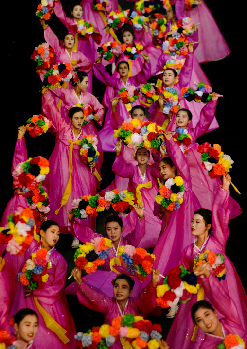 North Korean women dancing in choson-ot during the Arirang mass games in may day stadium, Pyongan Province, Pyongyang, North Korea