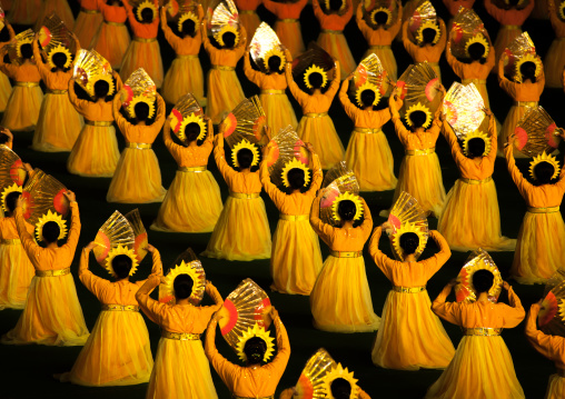 North Korean women dancing in choson-ot during the Arirang mass games in may day stadium, Pyongan Province, Pyongyang, North Korea