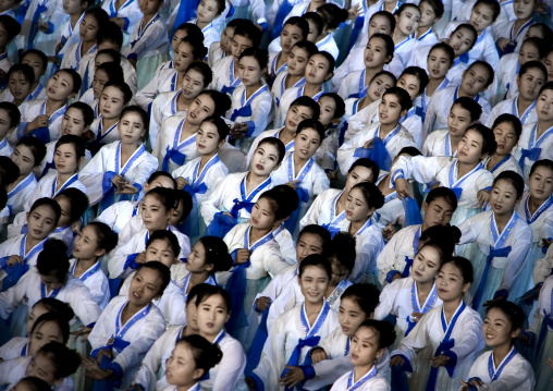 North Korean women dancing in choson-ot during the Arirang mass games in may day stadium, Pyongan Province, Pyongyang, North Korea