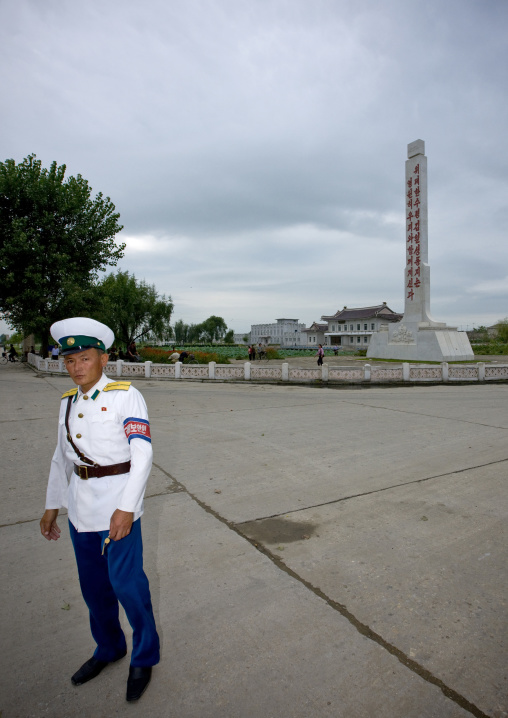 North Korean male traffic security officer in white uniform in the street, North Hwanghae Province, Kaesong, North Korea