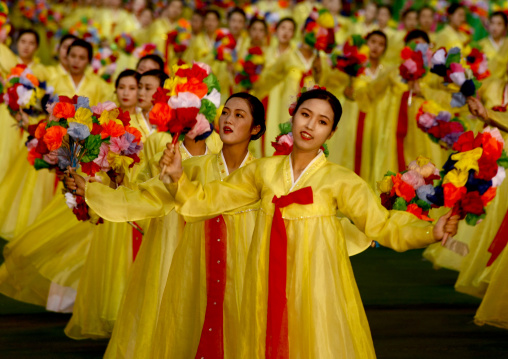 North Korean women dancing in choson-ot during the Arirang mass games in may day stadium, Pyongan Province, Pyongyang, North Korea