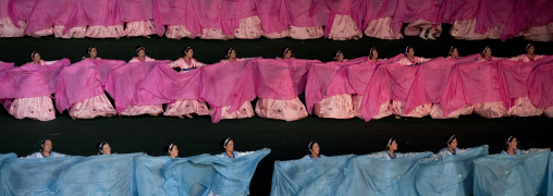 North Korean women dancing in choson-ot during the Arirang mass games in may day stadium, Pyongan Province, Pyongyang, North Korea