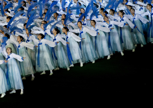 North Korean women dancing in choson-ot during the Arirang mass games in may day stadium, Pyongan Province, Pyongyang, North Korea