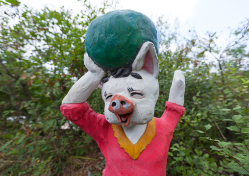 Laughing pig statue in a park, Pyongan Province, Pyongyang, North Korea