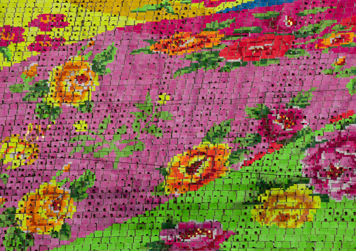 Flowers made by children pixels holding up colored boards during Arirang mass games in may day stadium, Pyongan Province, Pyongyang, North Korea