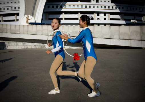 North Korean gymnasts going to the Arirang mass games outside of may day stadium
, Pyongan Province, Pyongyang, North Korea