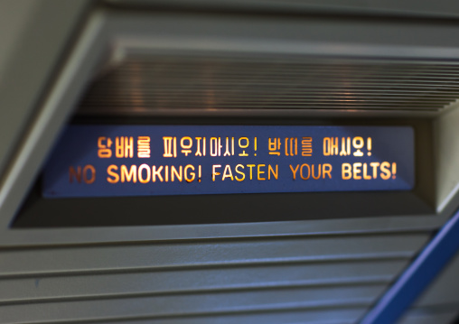 Warning sign in an air Koryo plane, Pyongan Province, Pyongyang, North Korea