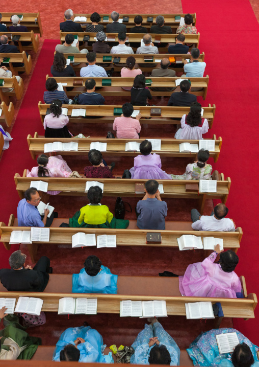 North Korean worshiper reading the bible during a sunday mass in protestant Bongsu church, Pyongan Province, Pyongyang, North Korea