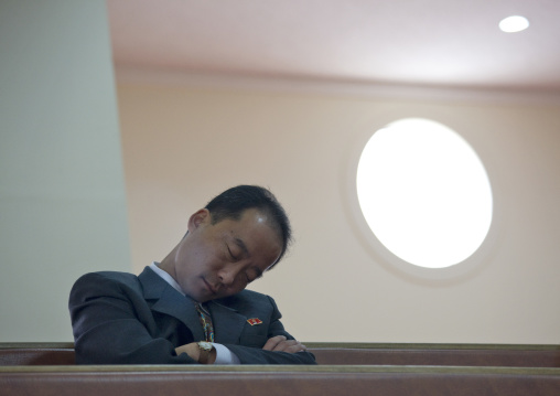 North Korean official sleeping in protestant Bongsu church, Pyongan Province, Pyongyang, North Korea