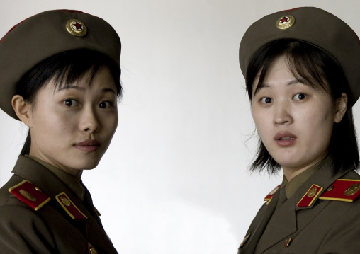 North Korean museum guides in the victorious fatherland liberation war museum, Pyongan Province, Pyongyang, North Korea