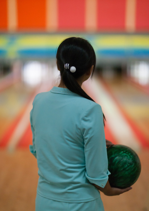 North Korean woman playing bowling, Pyongan Province, Pyongyang, North Korea