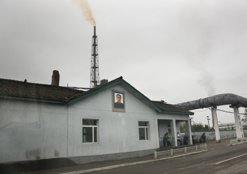 Chemical factory with the portrait of Kim il Sung, South Hamgyong Province, Hamhung, North Korea