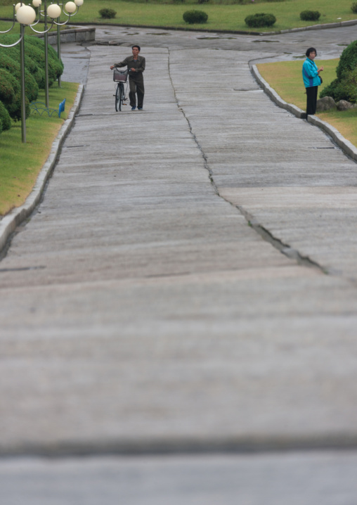 North Korean people on an empty road, South Hamgyong Province, Hamhung, North Korea