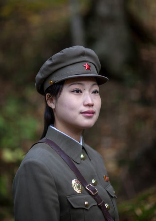 Portrait of a cute North Korean guide in military style uniform, Ryanggang Province, Chongbong, North Korea