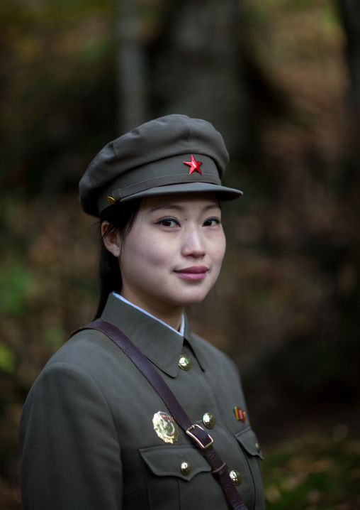 Portrait of a cute North Korean guide in military style uniform, Ryanggang Province, Chongbong, North Korea