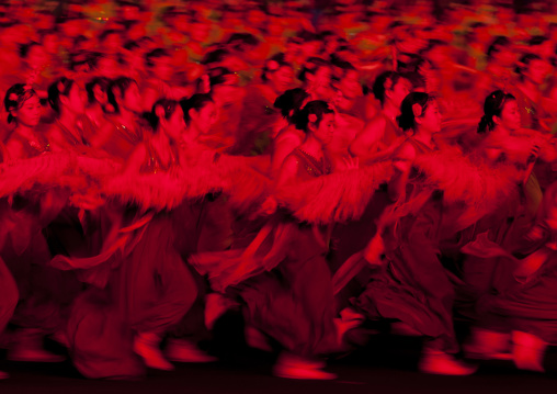 North Korean women dancing in choson-ot during the Arirang mass games in may day stadium, Pyongan Province, Pyongyang, North Korea