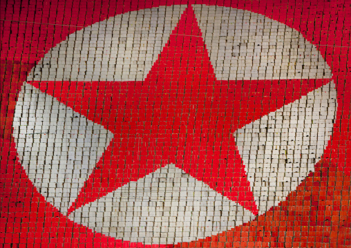 North Korean flag made by human pixels holding up colored boards during Arirang mass games in may day stadium, Pyongan Province, Pyongyang, North Korea