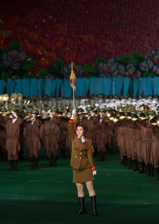 Sexy North Korean women dressed as soldiers dancing with swords during the Arirang mass games in may day stadium, Pyongan Province, Pyongyang, North Korea