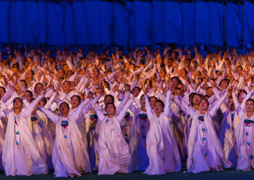 North Korean women dancing in choson-ot during the Arirang mass games in may day stadium, Pyongan Province, Pyongyang, North Korea