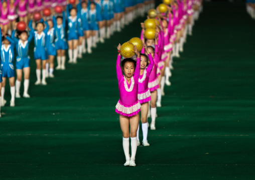 North Korean children performing with balloons during the Arirang mass games in may day stadium, Pyongan Province, Pyongyang, North Korea