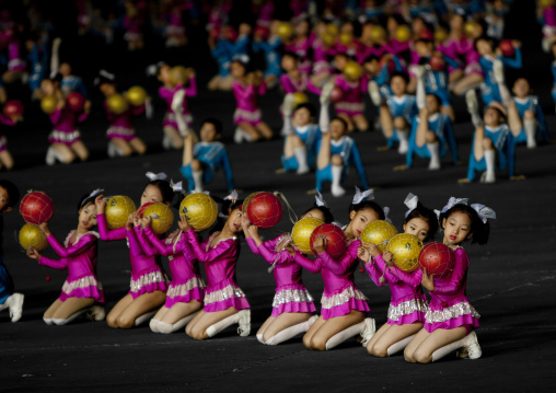 North Korean children performing with balloons during the Arirang mass games in may day stadium, Pyongan Province, Pyongyang, North Korea