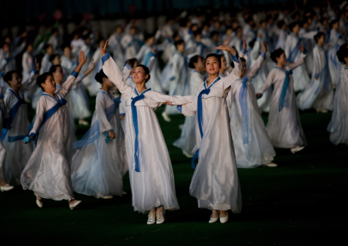 North Korean women dancing in choson-ot during the Arirang mass games in may day stadium, Pyongan Province, Pyongyang, North Korea