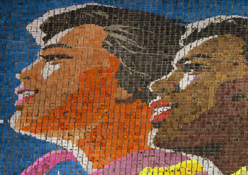 Multiracial people made by children pixels holding up colored boards during Arirang mass games in may day stadium, Pyongan Province, Pyongyang, North Korea