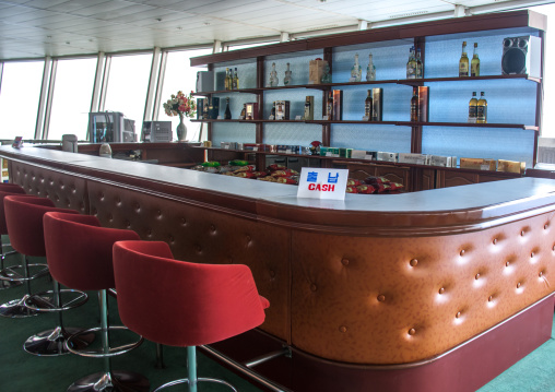 Empty bar in Yanggakdo international hotel with a cash billboard, Pyongan Province, Pyongyang, North Korea