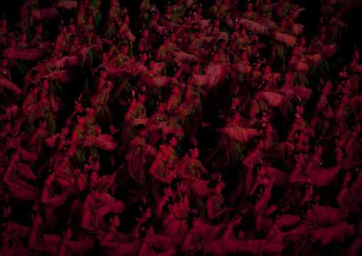 North Korean women dancing in choson-ot during the Arirang mass games in may day stadium, Pyongan Province, Pyongyang, North Korea