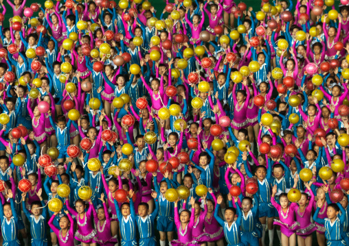 North Korean children performing with balloons during the Arirang mass games in may day stadium, Pyongan Province, Pyongyang, North Korea